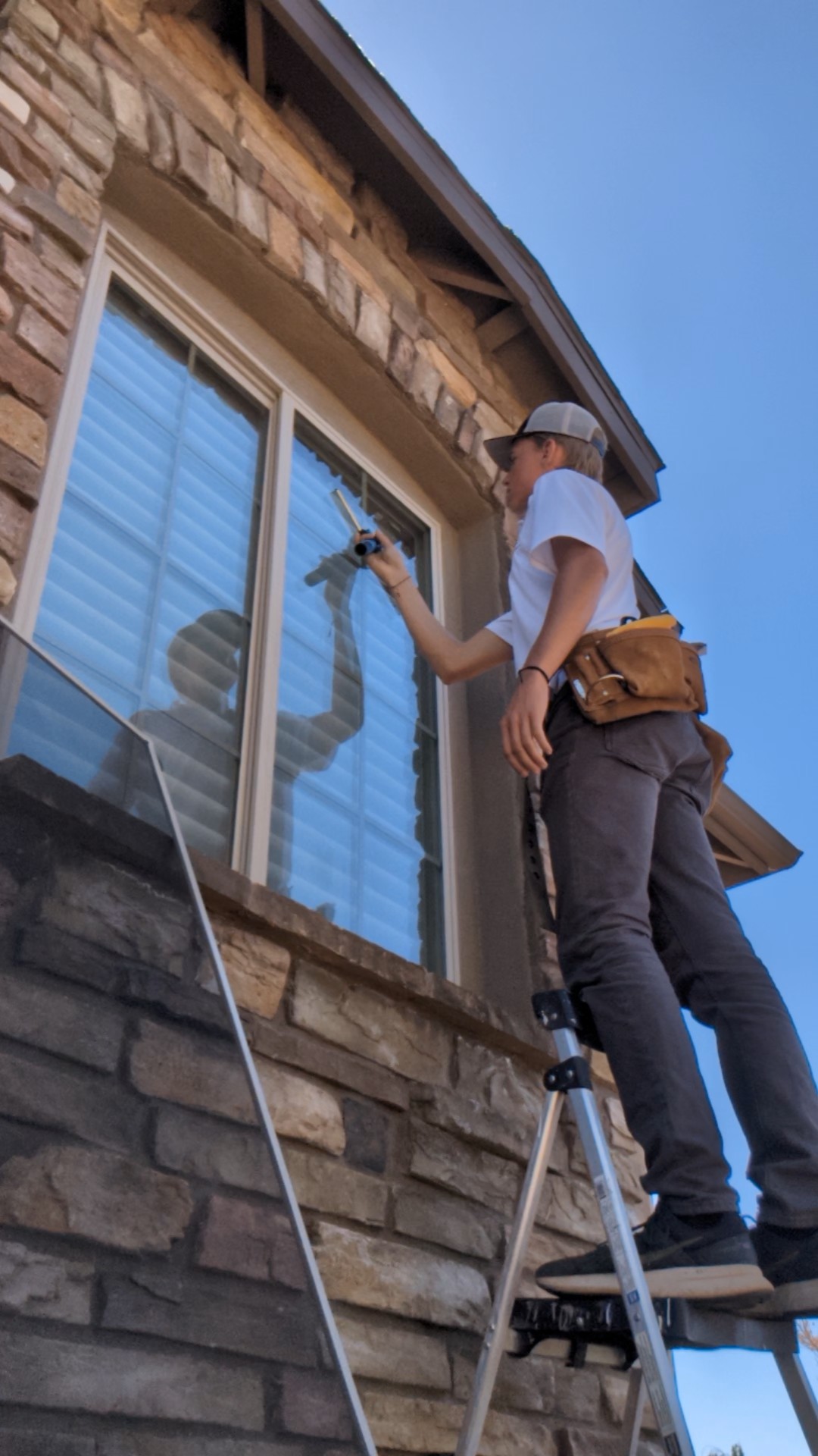 Cleaning a Prescott Lakes window